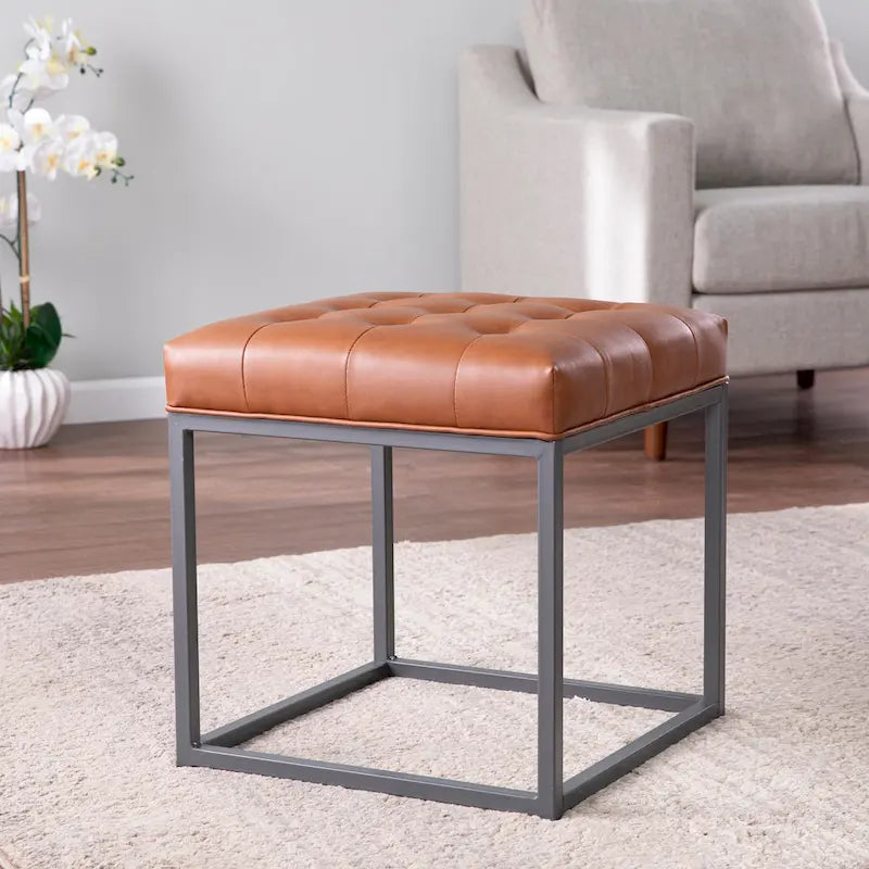 Mini pouf capitonné marron selle avec base en métal graphite
